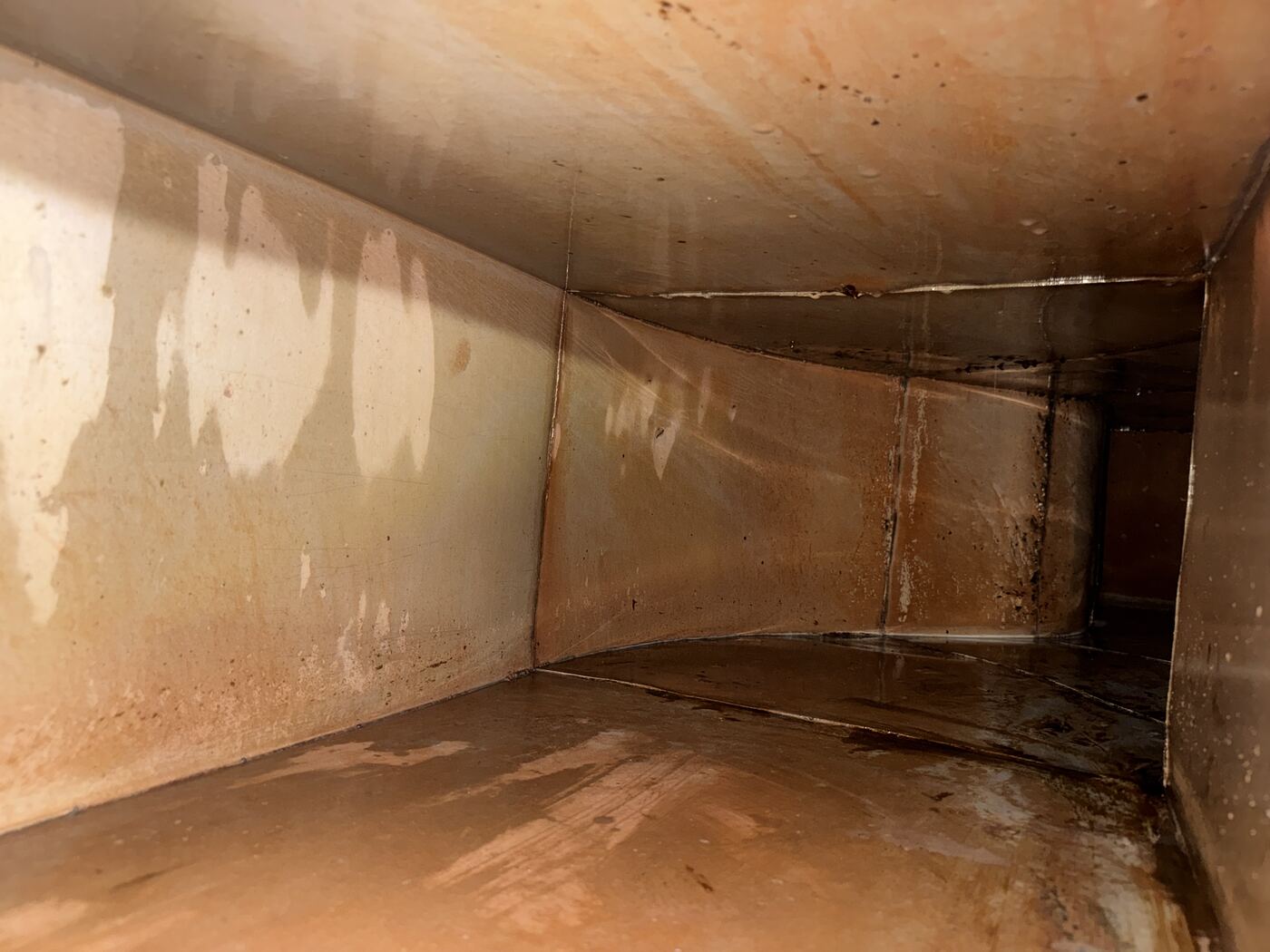Duct run with heavy grease buildup